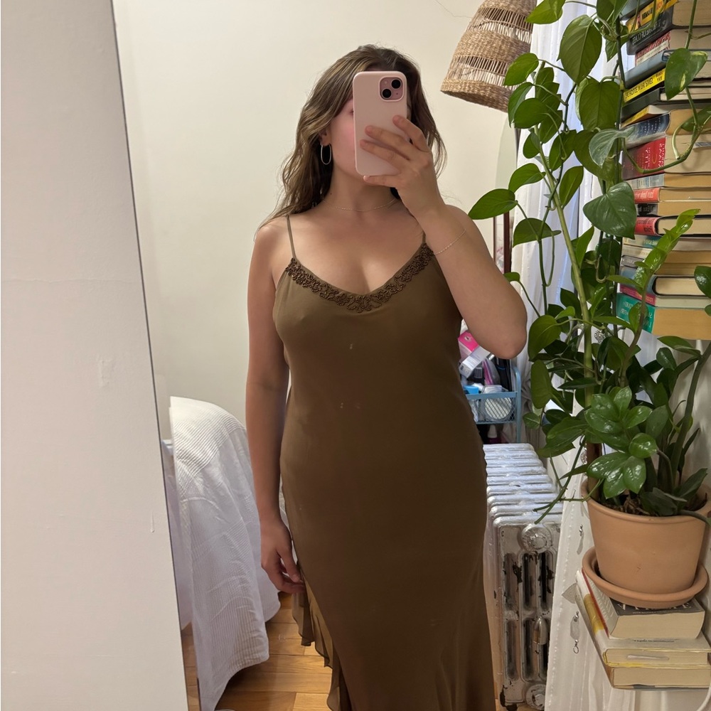 Newport News Silk spaghetti strap cocktail dress with Beaded design.